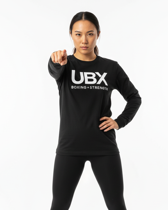 UBX Classic Long Sleeve T-Shirt Black — worn front view female model pointing at camera