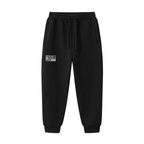 UBX Baseline Joggers Light Print Black — front view flat lay UBX patch on left thigh