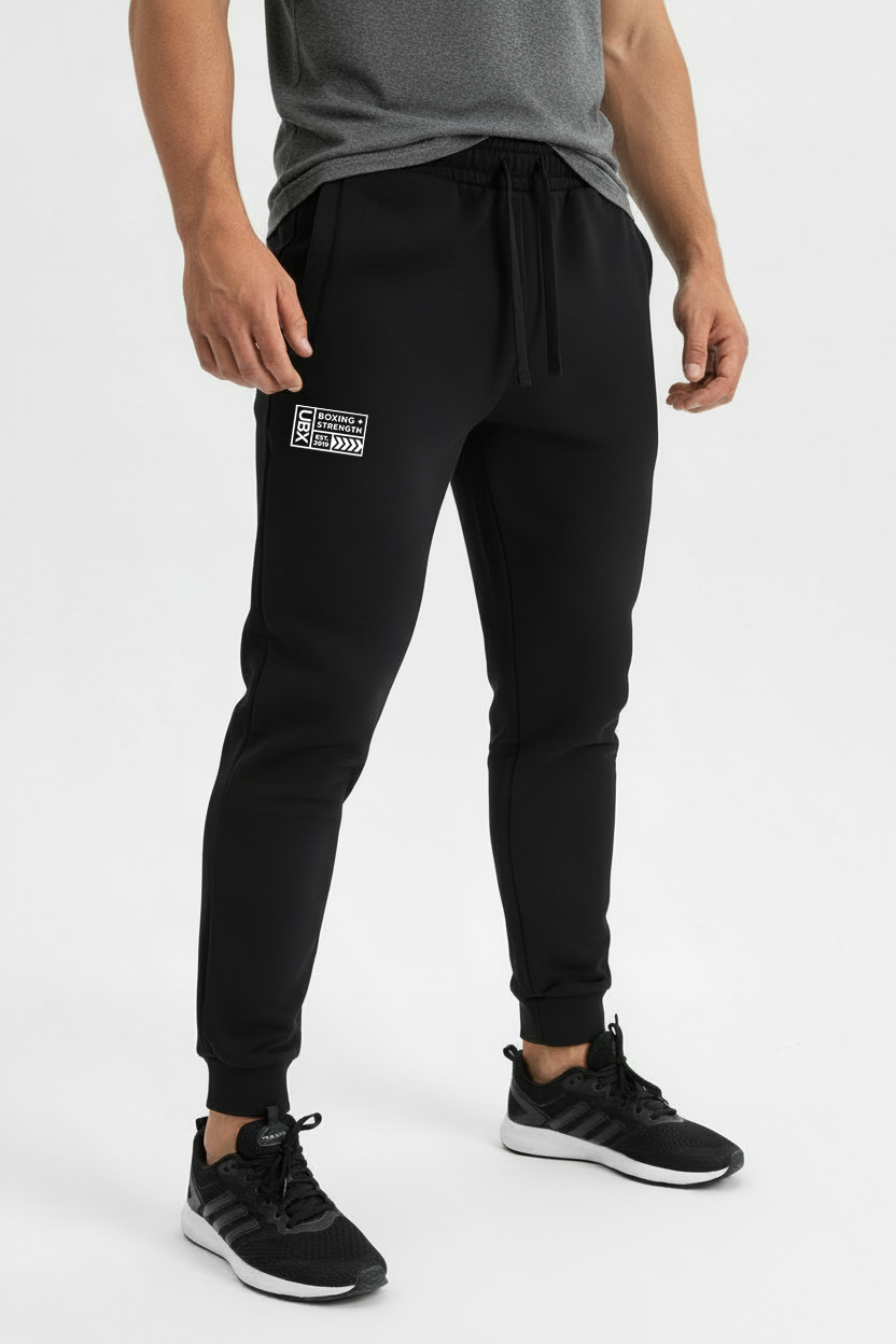 UBX Baseline Joggers Light Print Black — worn standing male model with sneakers