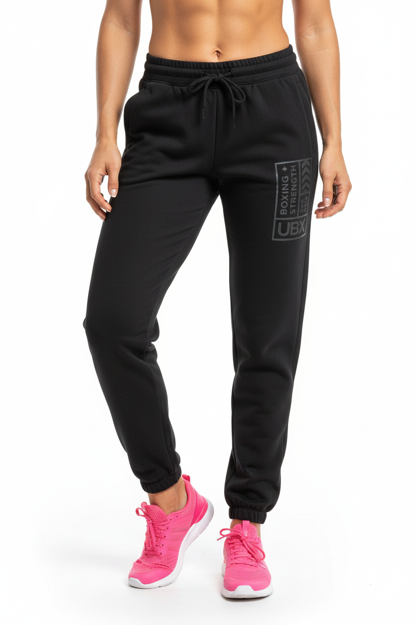 Black jogger pants with a logo on the side pocket against a white background