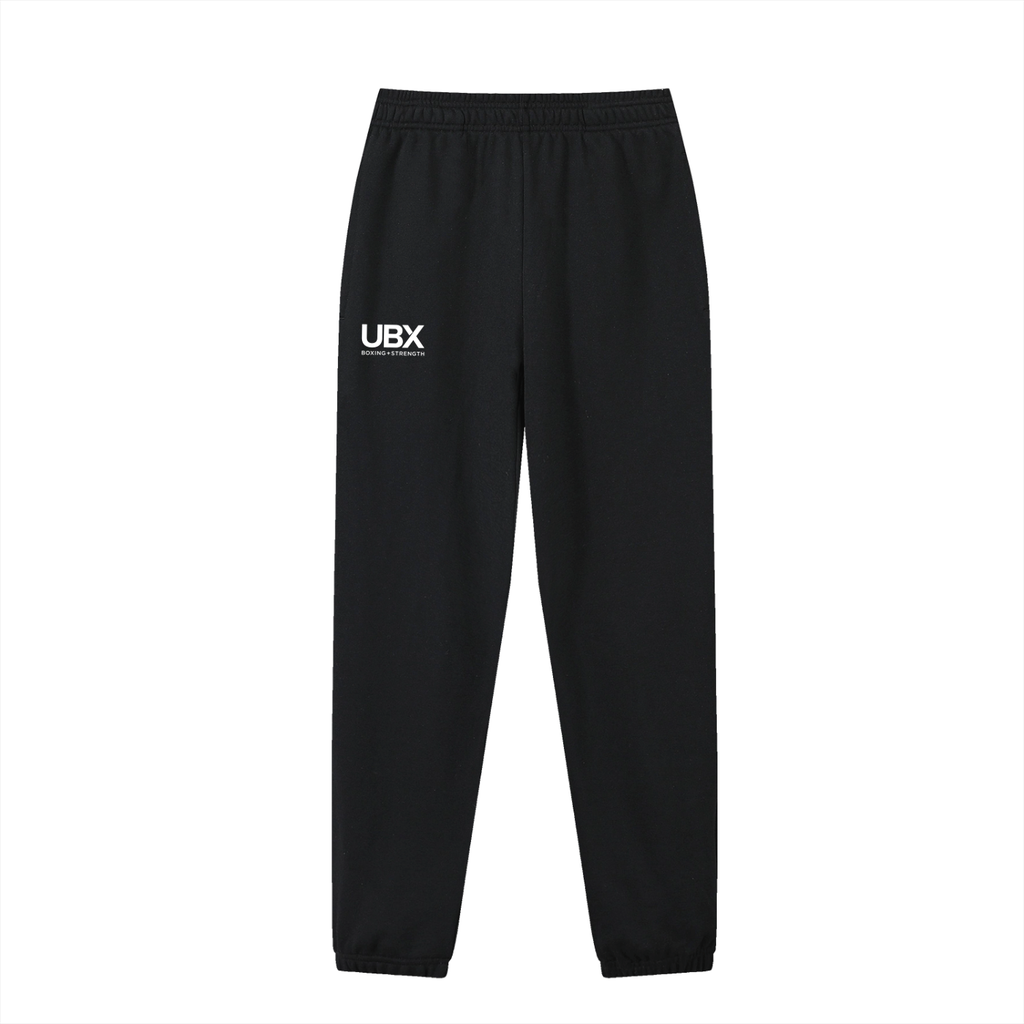 UBX Classic Joggers Black — front view flat lay UBX text on left thigh