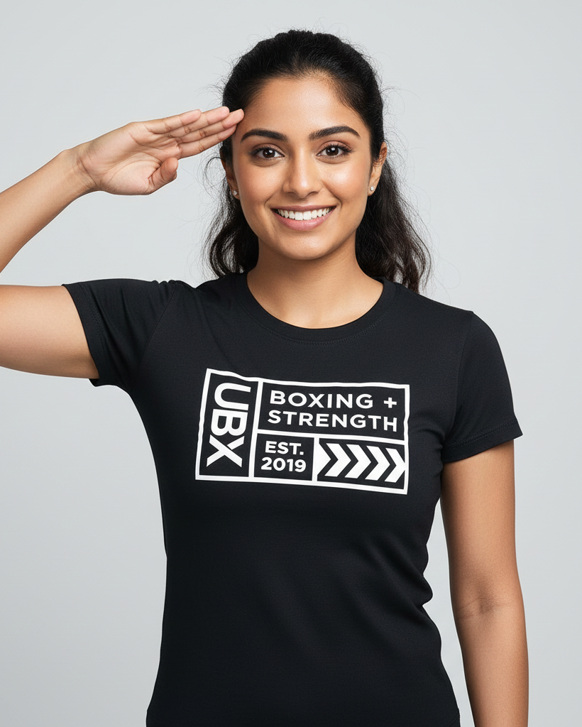 UBX Baseline Women's Bodycon T-Shirt Light Print Black — worn front view female model saluting